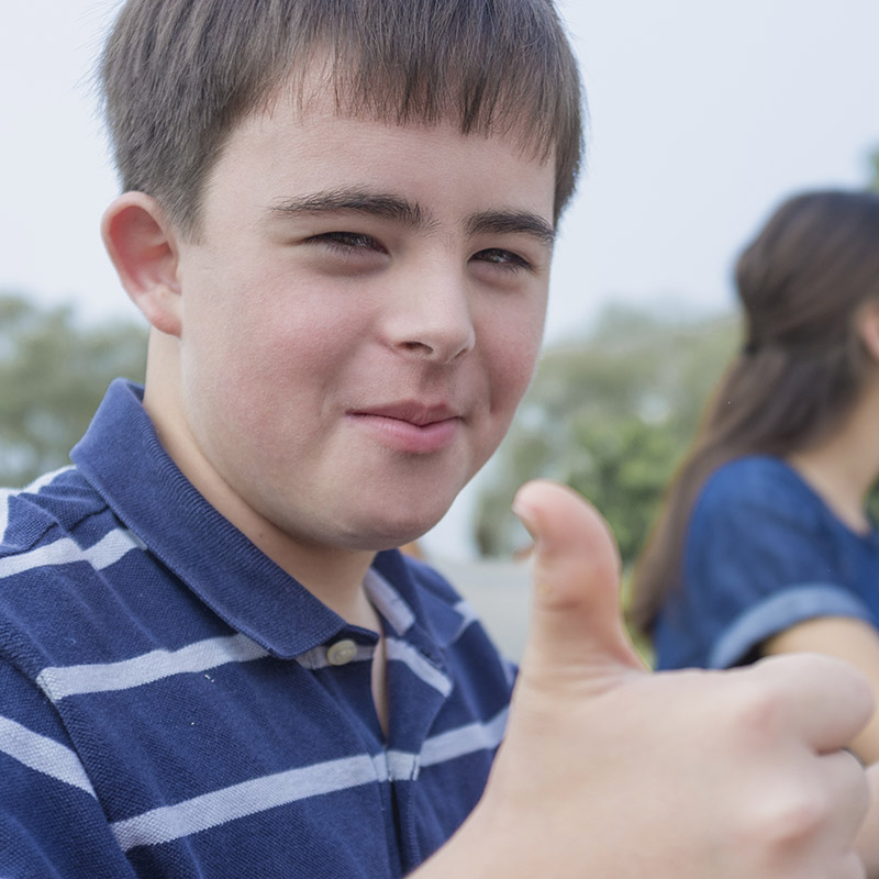 Happy Child with thumbs up